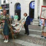 Folkestone Waves Goodbye to the ‘Coat of Hopes’ on Its Journey of Unity